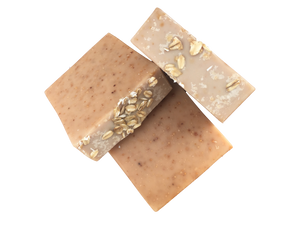 tan oatmeal milk and honey soap with oatmeal on top
