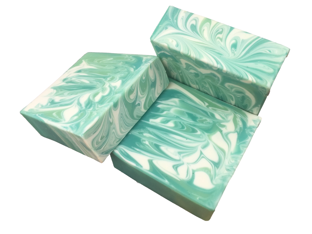 green and white swirled rosemary and spearmint soap