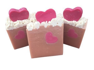 brown sweethearts in carhartts soap with white frosting, a heart on the inside and a heart on the top